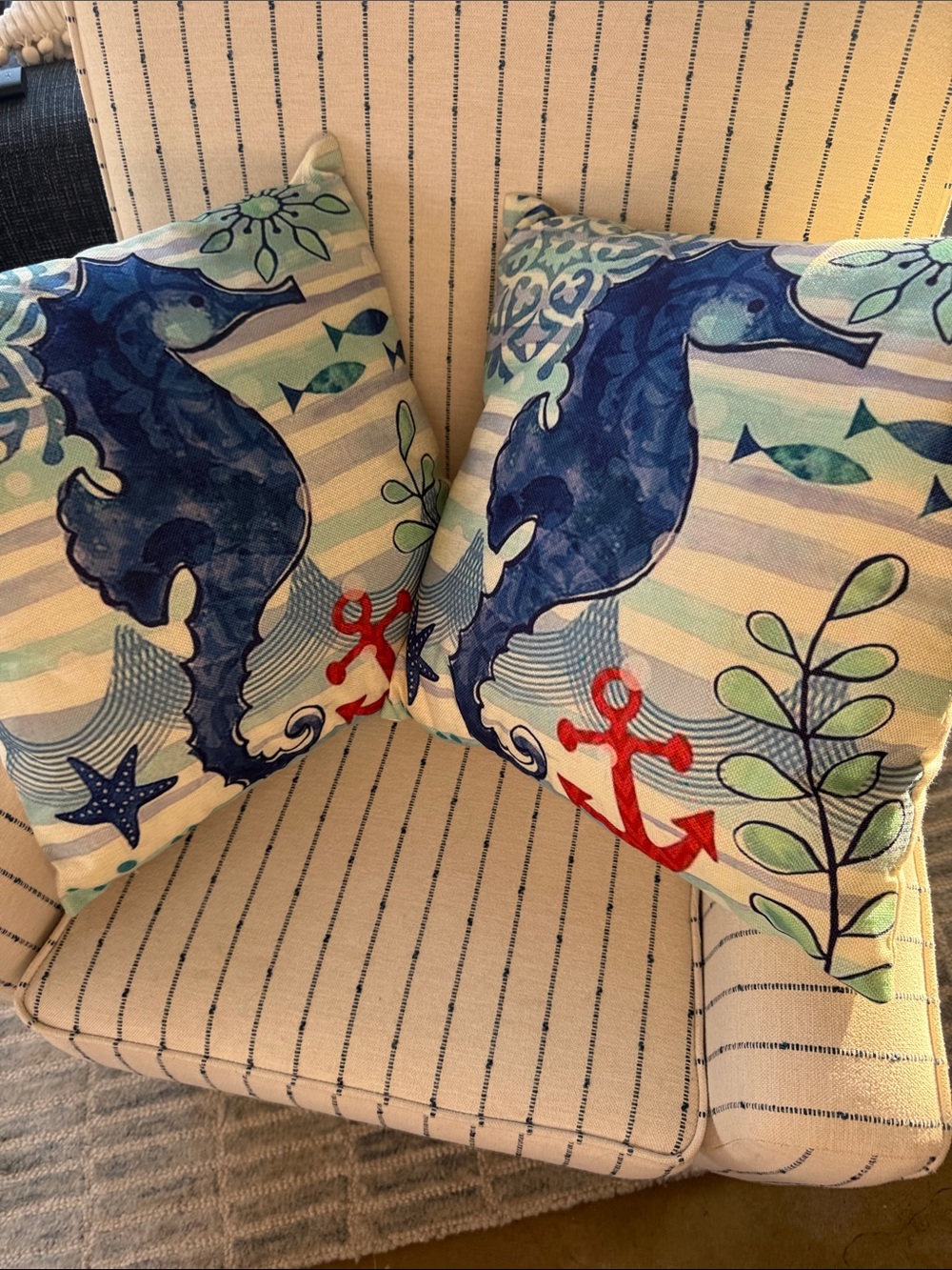 Two sea horse pillows